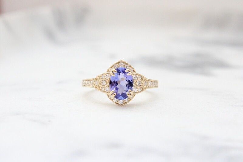 14ky Oval Tanzanite with Vintage Inspired Halo, 30 Round Diamonds at .23ct Total 