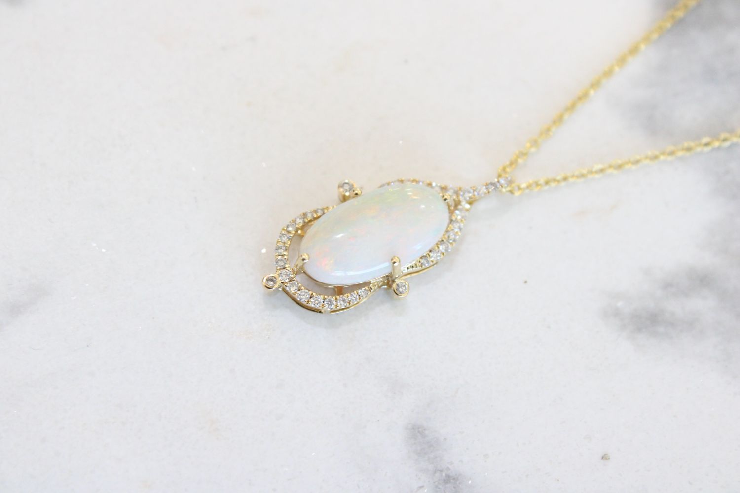 14ky Opal &amp; Diamond Pendent, 1 Oval Opal at 1.48ct &amp; 35 Diamonds at .16ct Total on 10ky 18&quot; 1.2mm Cable Chain