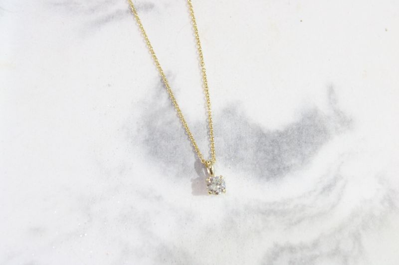 14ky .49ct Diamond Solitaire Pendant on 10ky 18&quot; 1.2mm Cable Chain