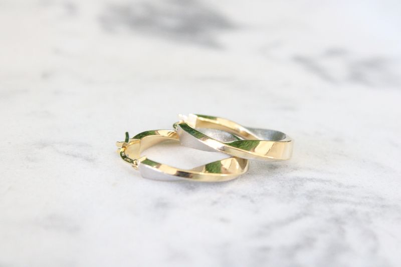 14ky with White Rhodium Polished and Satin Oval Twist Hoop Earrings 14ky with White Rhodium Polished and Satin Oval Twist Hoop Earrings