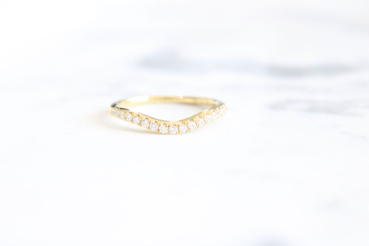 18kt Yellow Gold 17 Round Diamonds at .21cts Curved Diamond Band