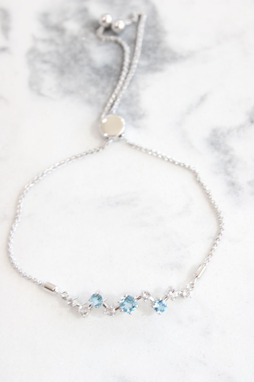 Sterling Silver White &amp; Blue Topaz Scattered BOLO Bracelet