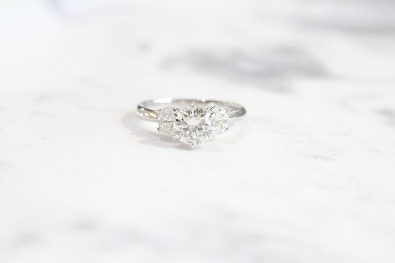 18kt White Gold 1.50ct Oval Past Present Future Ring, 1 @ 1ct, 2 @ .25ct Each