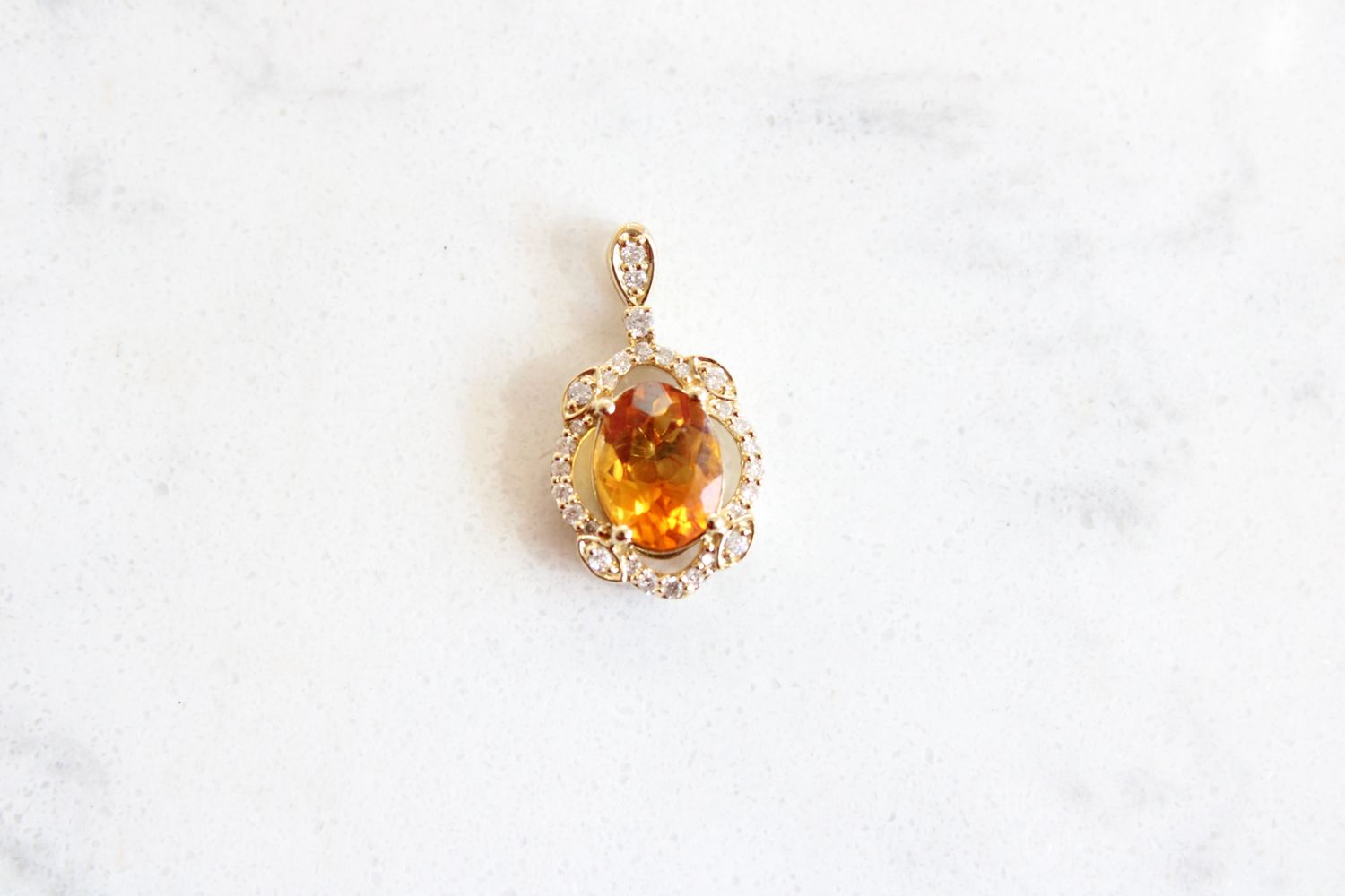 14kt Yellow gold .11ct Diamond 1.75ct Oval Citrine Vintage Halo Pendant