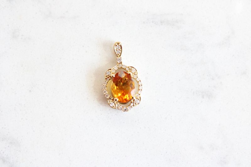 14kt Yellow gold .11ct Diamond 1.75ct Oval Citrine Vintage Halo Pendant