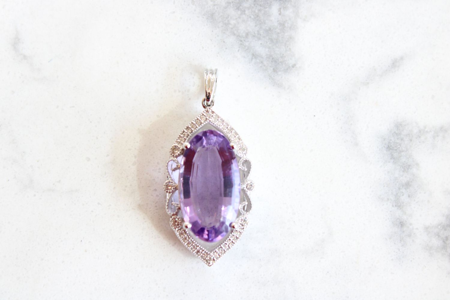 14kt White Gold .14ct Diamond 7.17ct Oval Amethyst Scroll Halo Pendant