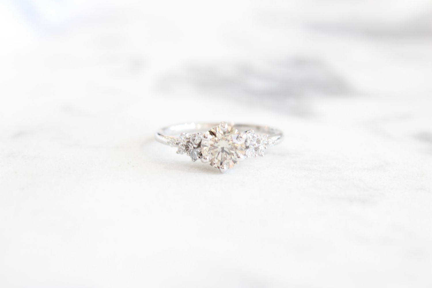 18kw 1.13ct Diamond Round Center Scattered Diamond Shank Ring, 1 @ 1ct, 10 Round Diamonds at .13ct Total 