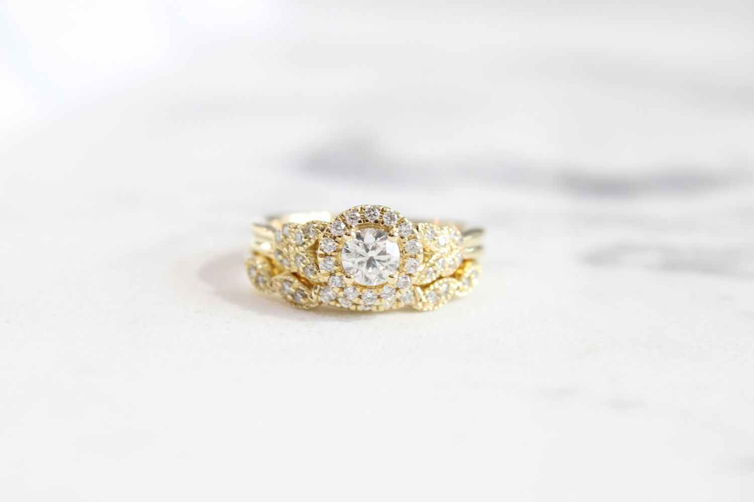 14kt Yellow Gold .70ct, .40ct Center Diamond Halo with Geometric Migraine Wedding Set
