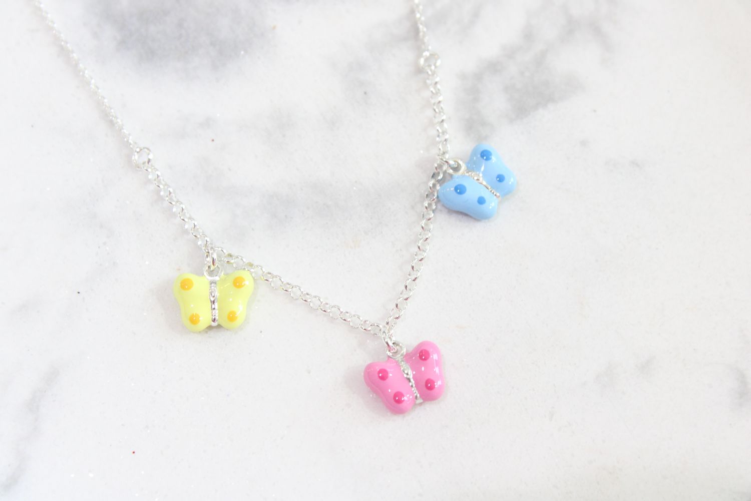 Sterling Silver Polished Yellow, Pink and Blue Enameled Three Butterfly Children's Necklace Sterling Silver Polished Yellow, Pink and Blue Enameled Three Butterfly Children's Necklace