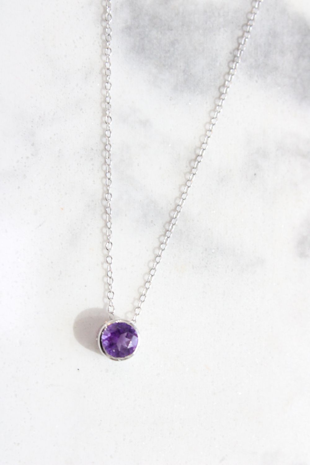 10kt White Gold Bezel Set Amethyst Solitaire Pendant