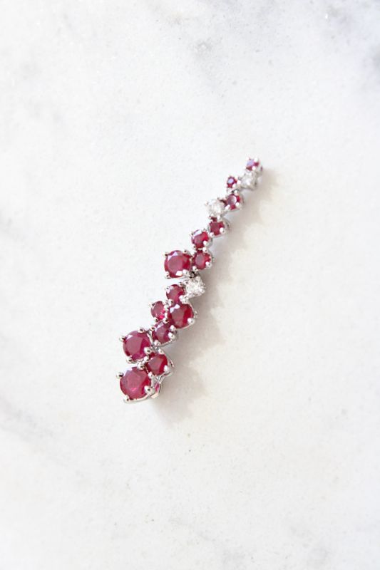 18kt White Gold Scattered Diamond and Ruby Pendant, 14 Ruby at .92ct, 3 Diamond @ .06ct 