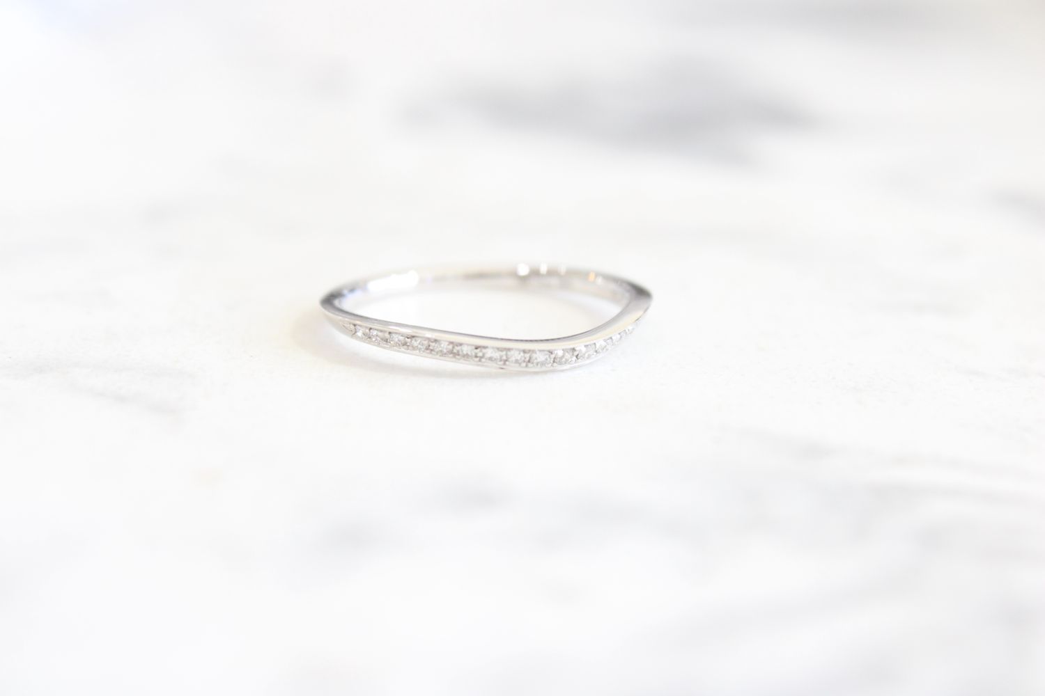 18k white gold diamond  slight curve wedding band 19 diamonds at .14 carat