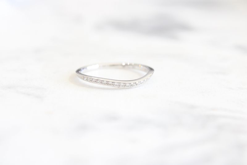 18k white gold diamond  slight curve wedding band 19 diamonds at .14 carat