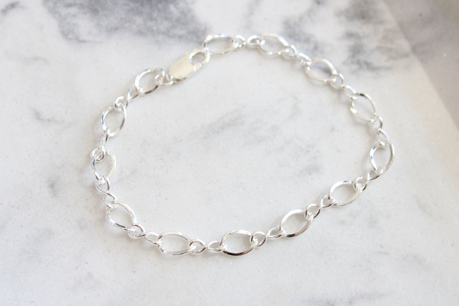 Polished Figure 8 Charm Bracelet
