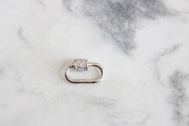 Rhodium plated Sterling silver with cubic zirconia Removable clasp
