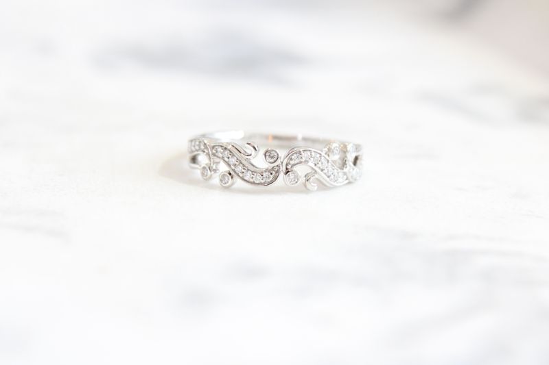 14K White Gold scroll wedding band .16C