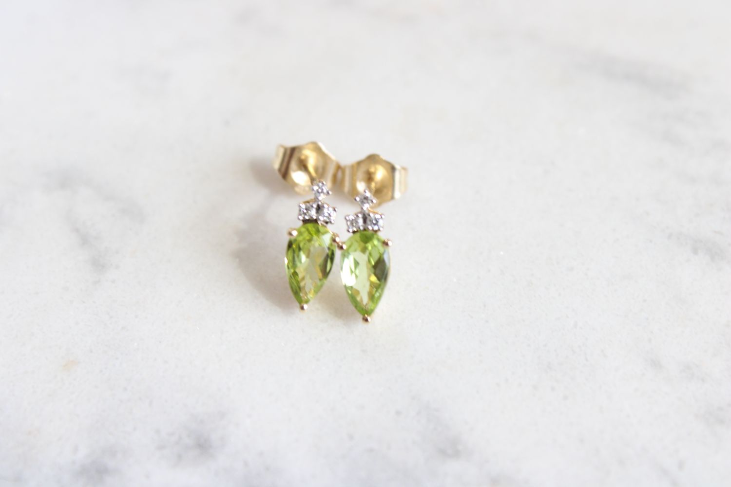 Peridot Earrings .05tdw 10k yellow gold