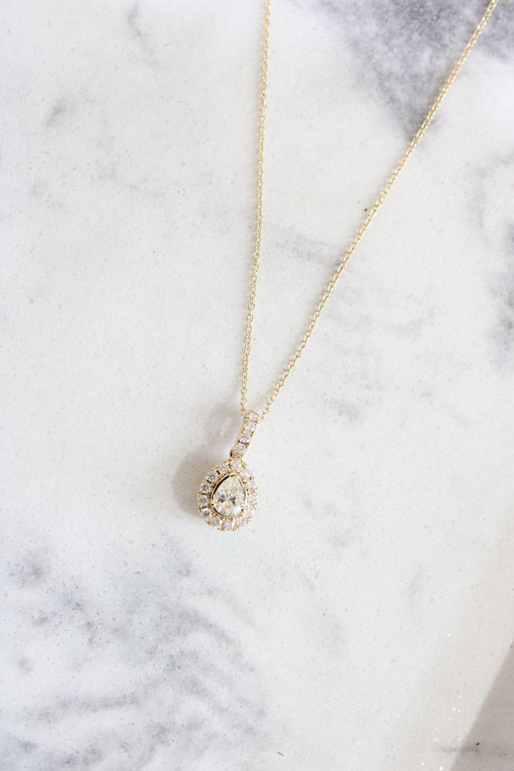 14k Yellow Gold Pear Shaped .34 Pendant with 17 Brilliant  .57 Carat total weight