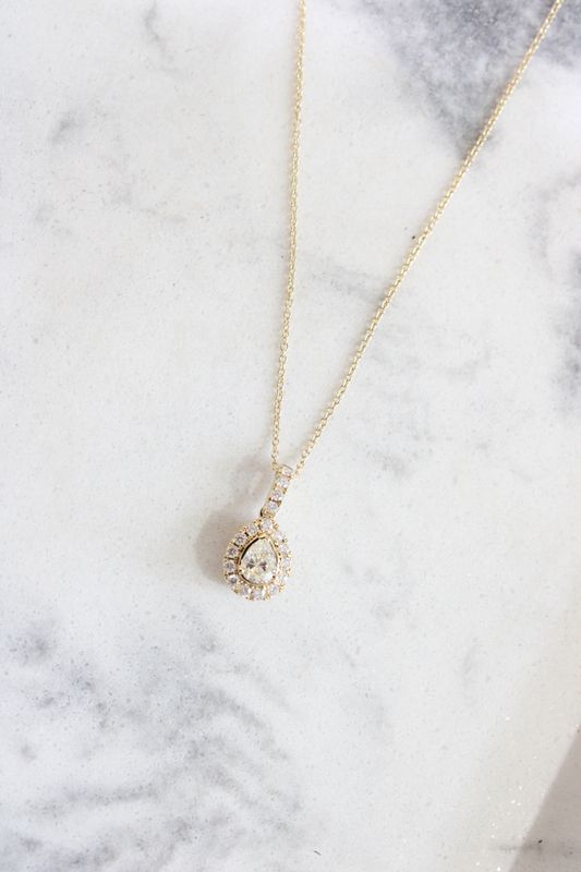 14k Yellow Gold Pear Shaped .34 Pendant with 17 Brilliant  .57 Carat total weight