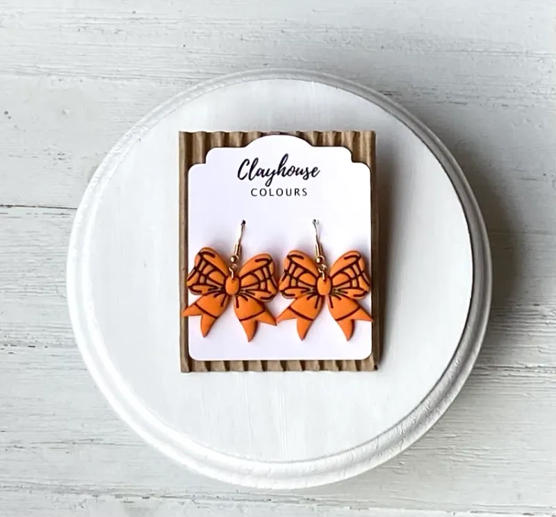 Gold Plated Basketball Bow Clay Earrings Gold Plated Basketball Bow Clay Earrings