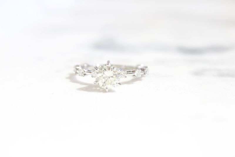 18kw 3/4ct, 1/3ct Round and Floating Diamond Ring, 10 Round Diamonds at .33cts 18kw 3/4ct, 1/3ct Round and Floating Diamond Ring, 10 Round Diamonds at .33cts