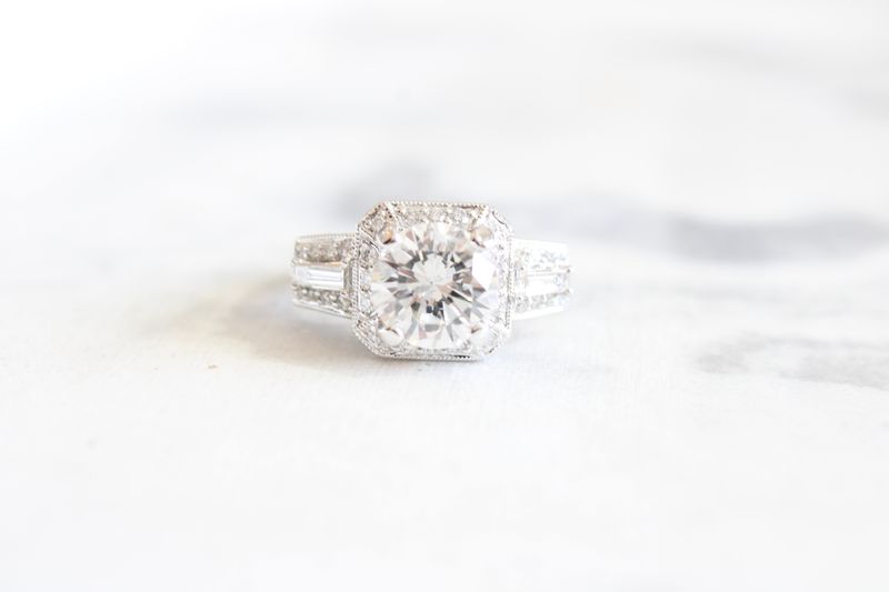 14kt White Gold 3ct, 2 1/4ct Round Center Vintage Diamond Halo and Tapered Baguette Side Ring 14kt White Gold 3ct, 2 1/4ct Round Center Vintage Diamond Halo and Tapered Baguette Side Ring