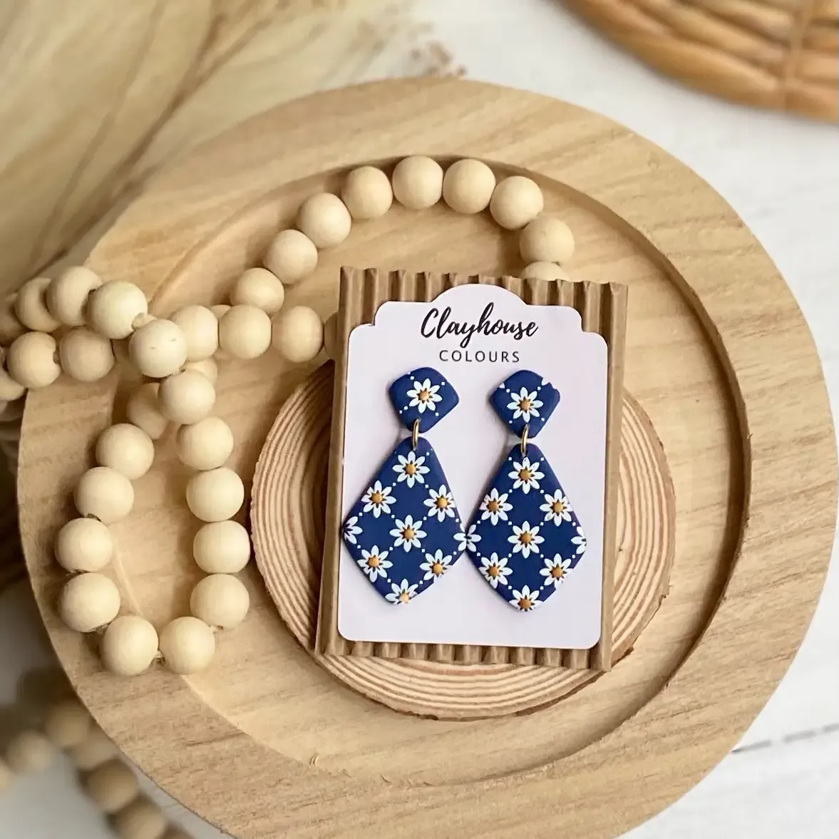 Navy & Gold Clay Earrings Daisy print Navy & Gold Clay Earrings Daisy print