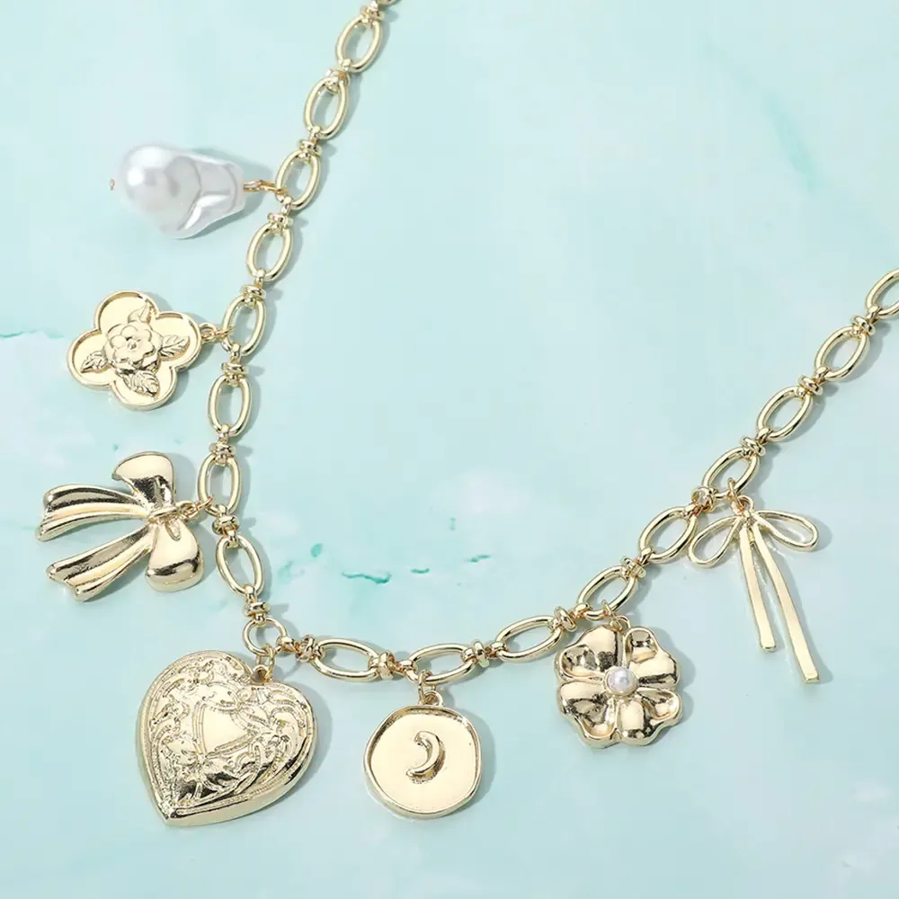 Metal Heart Bow Flower Quatrefoils Crescent Pearl Necklace Metal Heart Bow Flower Quatrefoils Crescent Pearl Necklace