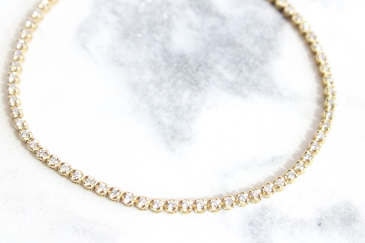 10kt Yellow Gold 60 Round Diamonds at 1ct Total Weight Diamond Tennis Bracelet 10kt Yellow Gold 60 Round Diamonds at 1ct Total Weight Diamond Tennis Bracelet