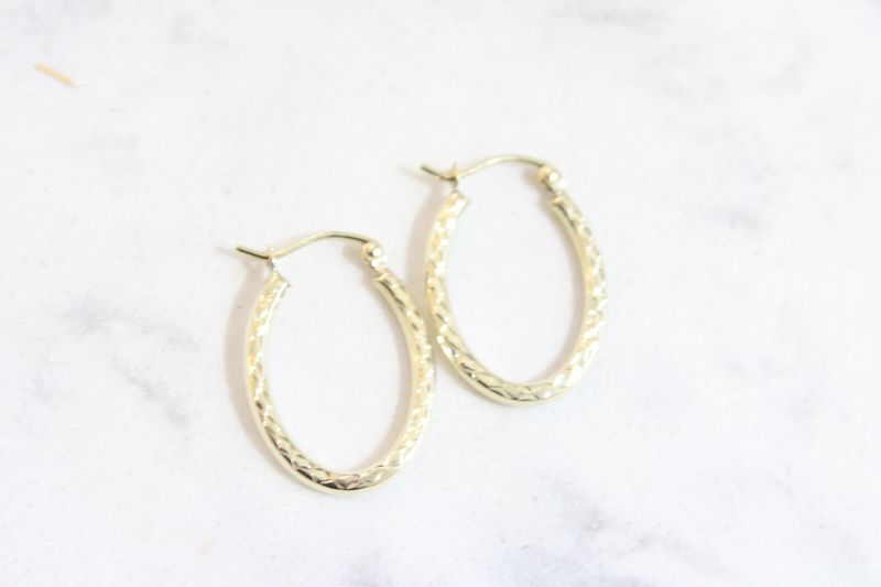 10K Textured Hollow Oval Hoop Earrings 10K Textured Hollow Oval Hoop Earrings