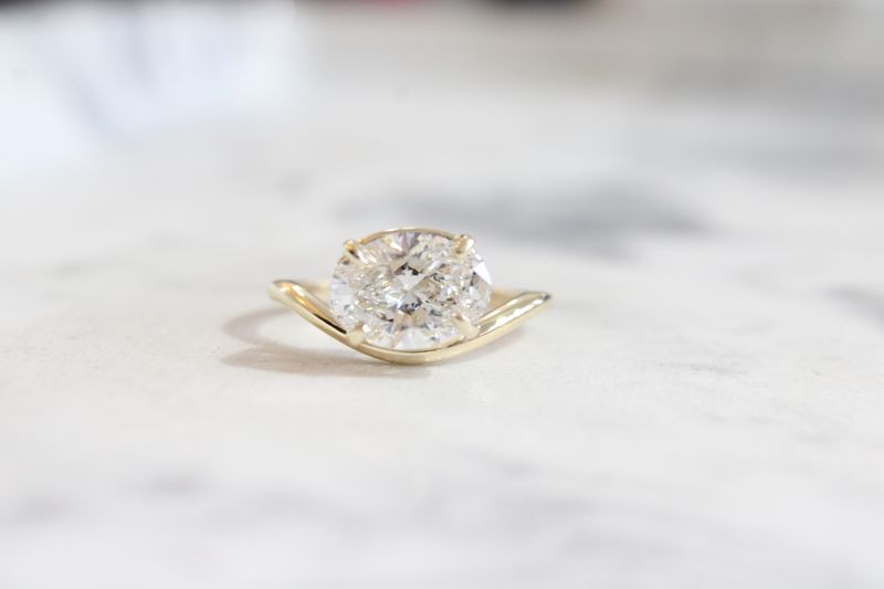 14kt Yellow Gold 2.5ct East to West Oval Lab Grown Diamond on Contour High Polished Band 14kt Yellow Gold 2.5ct East to West Oval Lab Grown Diamond on Contour High Polished Band