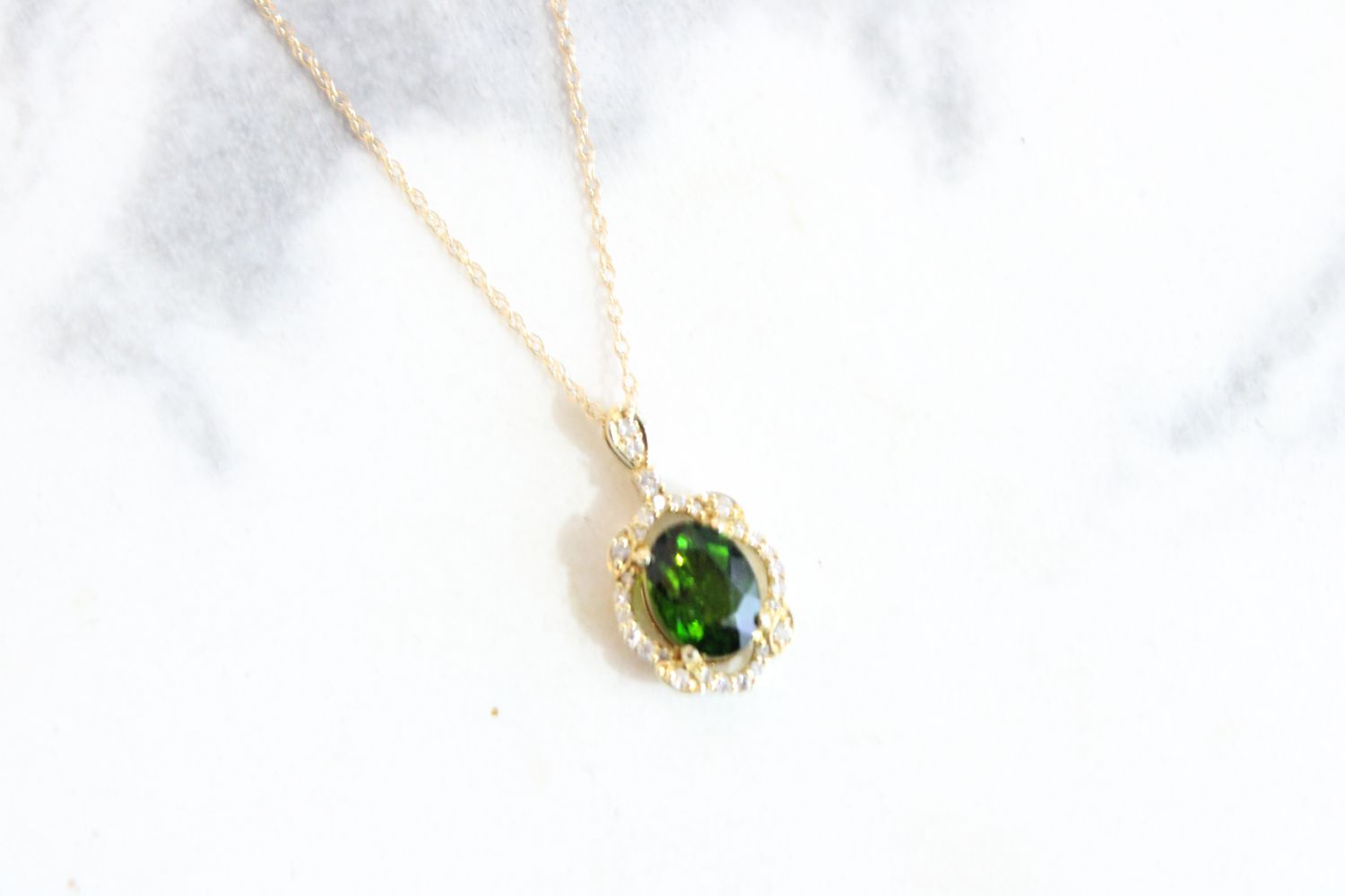 14kt Yellow gold .11ct Diamond 1.75ct Oval Tsavorite Vintage Halo Pendant 14kt Yellow gold .11ct Diamond 1.75ct Oval Tsavorite Vintage Halo Pendant