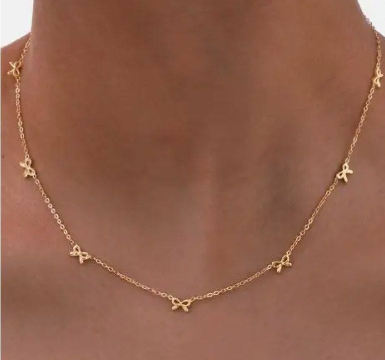Stainless 18kt Yellow Non Tarnish Bow Station Necklace Stainless 18kt Yellow Non Tarnish Bow Station Necklace