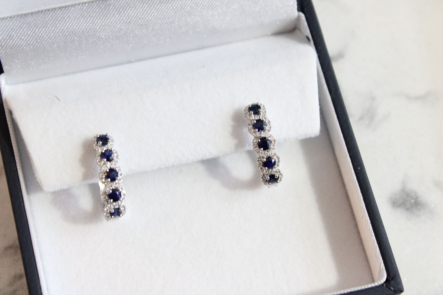 14k White Gold .75ct Sapphire Surrounded by 92 Brilliant Diamonds .25ct Earrings 14k White Gold .75ct Sapphire Surrounded by 92 Brilliant Diamonds .25ct Earrings