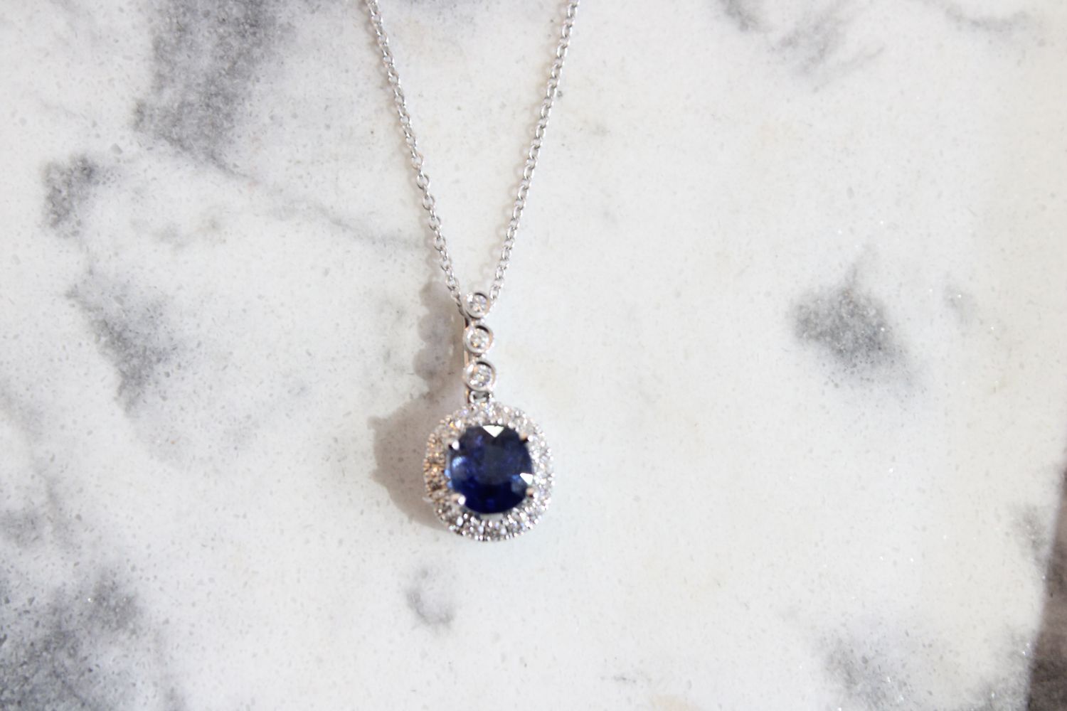 14k White Gold Sapphire 1.22ctw and 19 Brilliant Diamonds .18ctw Pendant 14k White Gold Sapphire 1.22ctw and 19 Brilliant Diamonds .18ctw Pendant