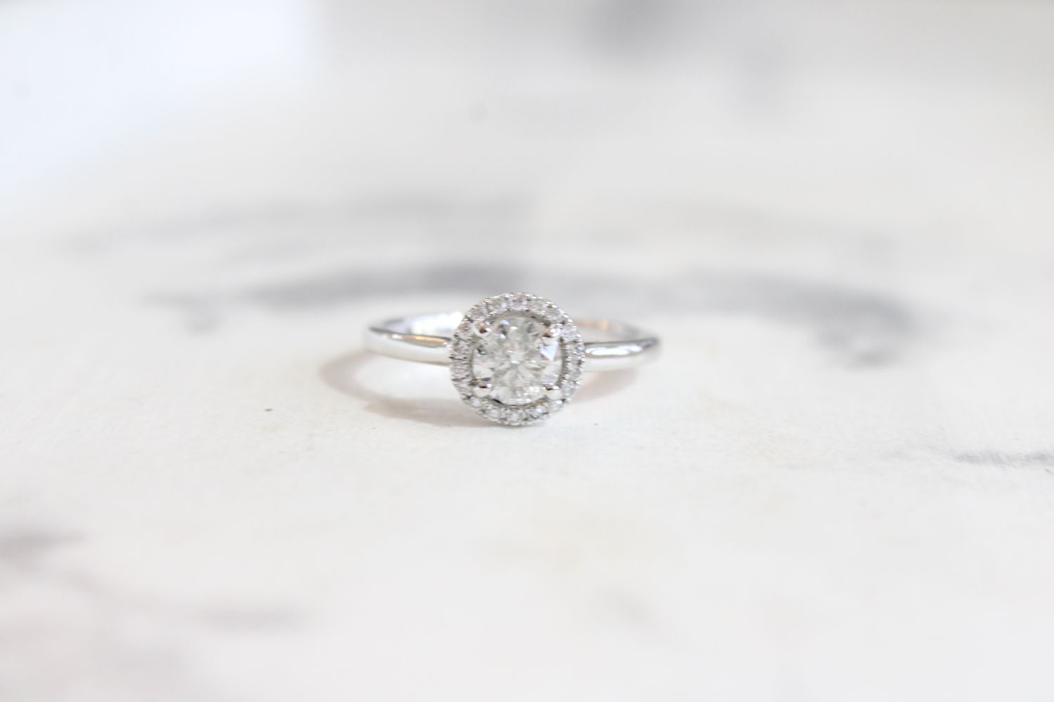 14kt White Gold 0.705 ct Total, 0.615ct Center Stone Round Halo Ring 14kt White Gold 0.705 ct Total, 0.615ct Center Stone Round Halo Ring