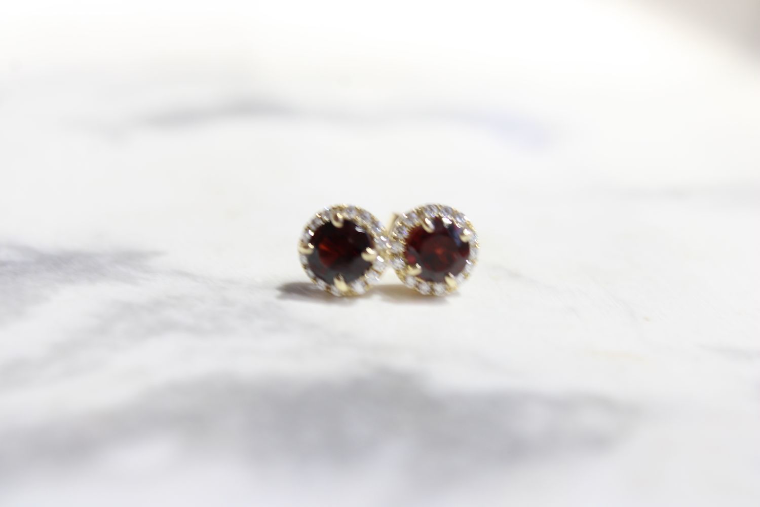 14K Yellow Gold Garnet Halo Earring Surrounded By 28 Brilliant Diamonds .16ct 14K Yellow Gold Garnet Halo Earring Surrounded By 28 Brilliant Diamonds .16ct