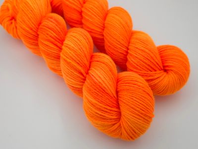 Orange Zing Ladybug on Organic Merino 225m/100g