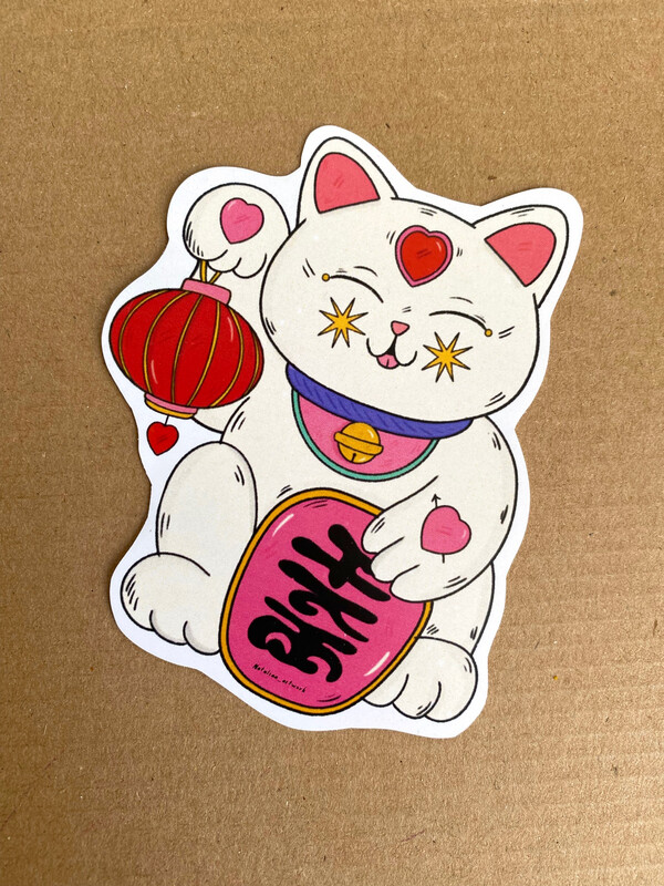Gatito de la suerte con corazón