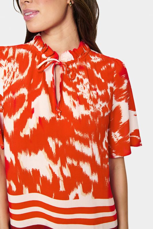 Vibrant print tie-neck blouse from  Saint Tropez