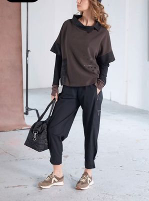 Naya Cuff drawstring trousers with side pocket and zips.