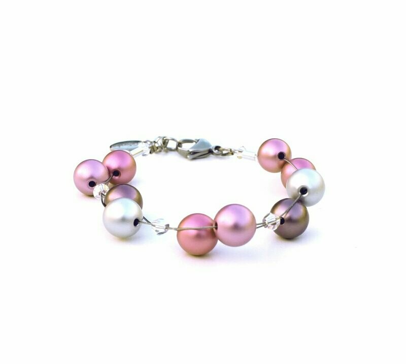 Verspieltes Armband in zarten Rosatönen
Eloxierte Aluminiumperlen und funkelnde Kristalle