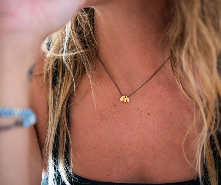 Bronwen Tiny Charm Three Petal Necklace Bronwen Tiny Charm Three Petal Necklace