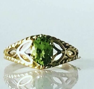 Golden 14 carat ring with tourmaline