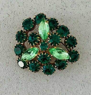 Brooch with green stones