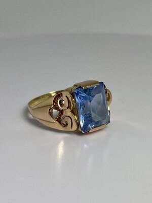 Golden ring with aquamarine