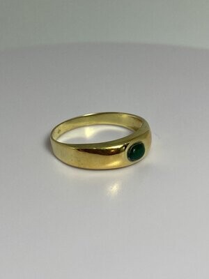 Golden ring with jade