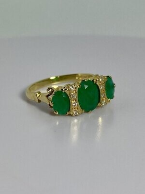 Ring with diamonds & emeralds
