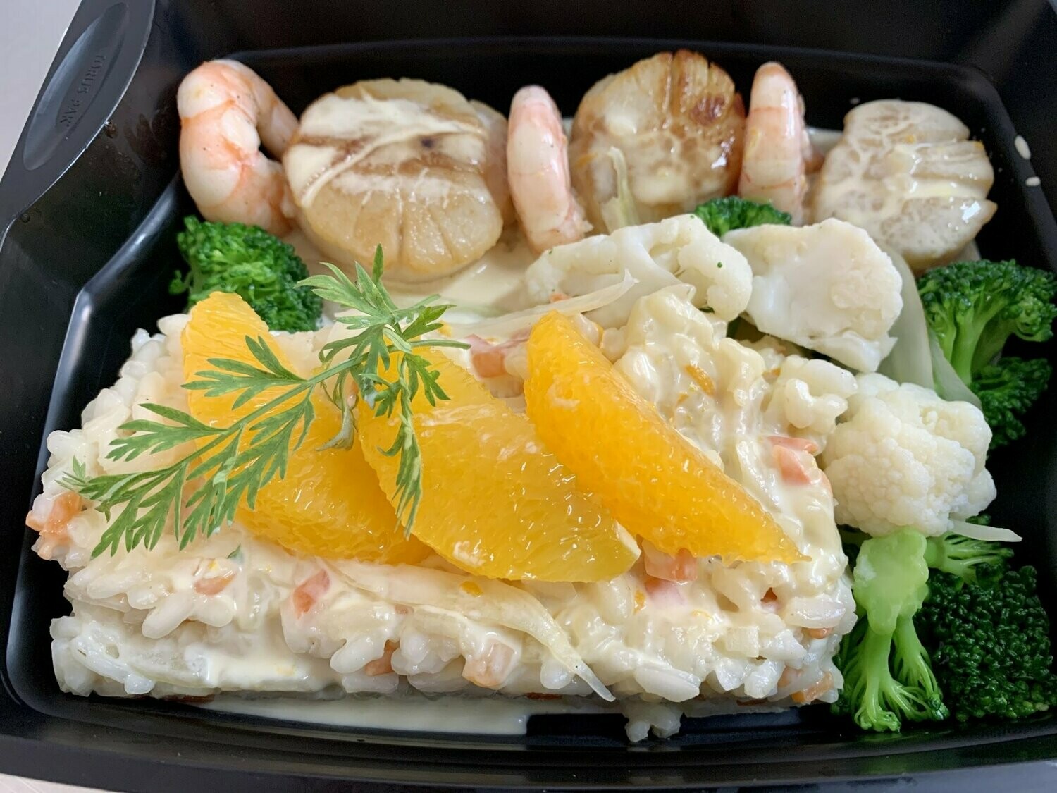 Risotto de Saint Jacques et Scampi sauce douce à l’orange