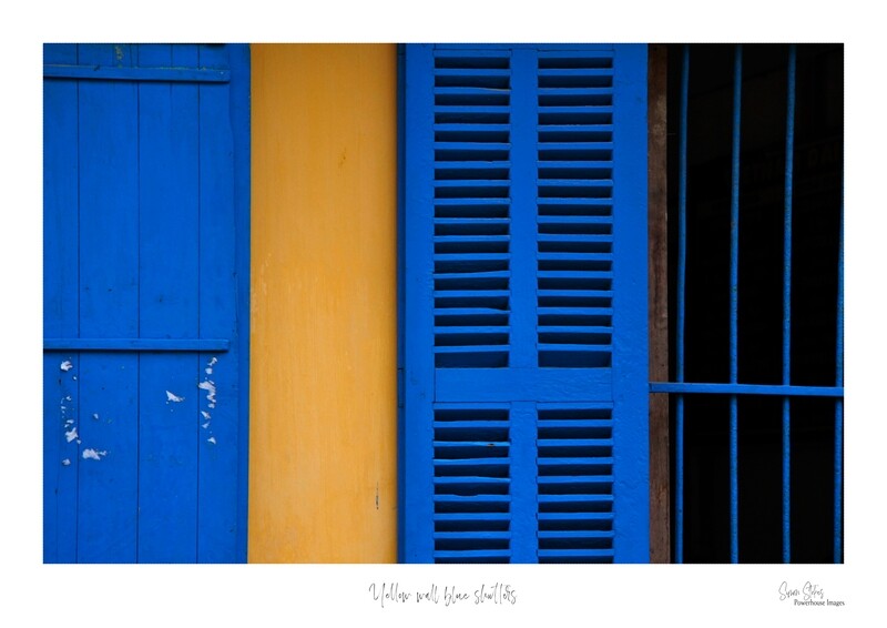 Yellow wall blue shutters #1